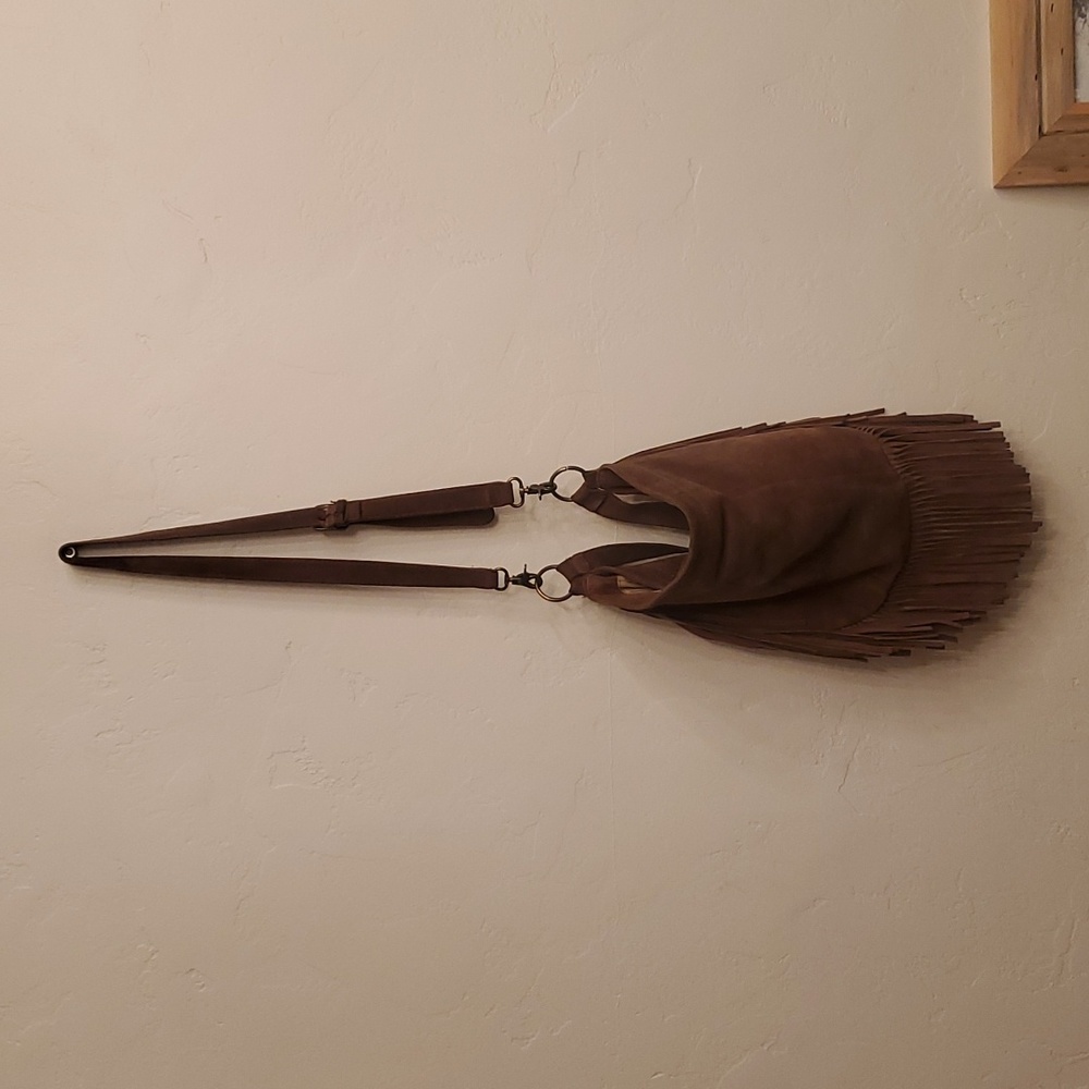 Lucky Brand brown suede boho bag with tassels needs new inner liner.